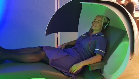 Nurse Jo using one of the relaxing pods in our Wellbeing Hub.jpg